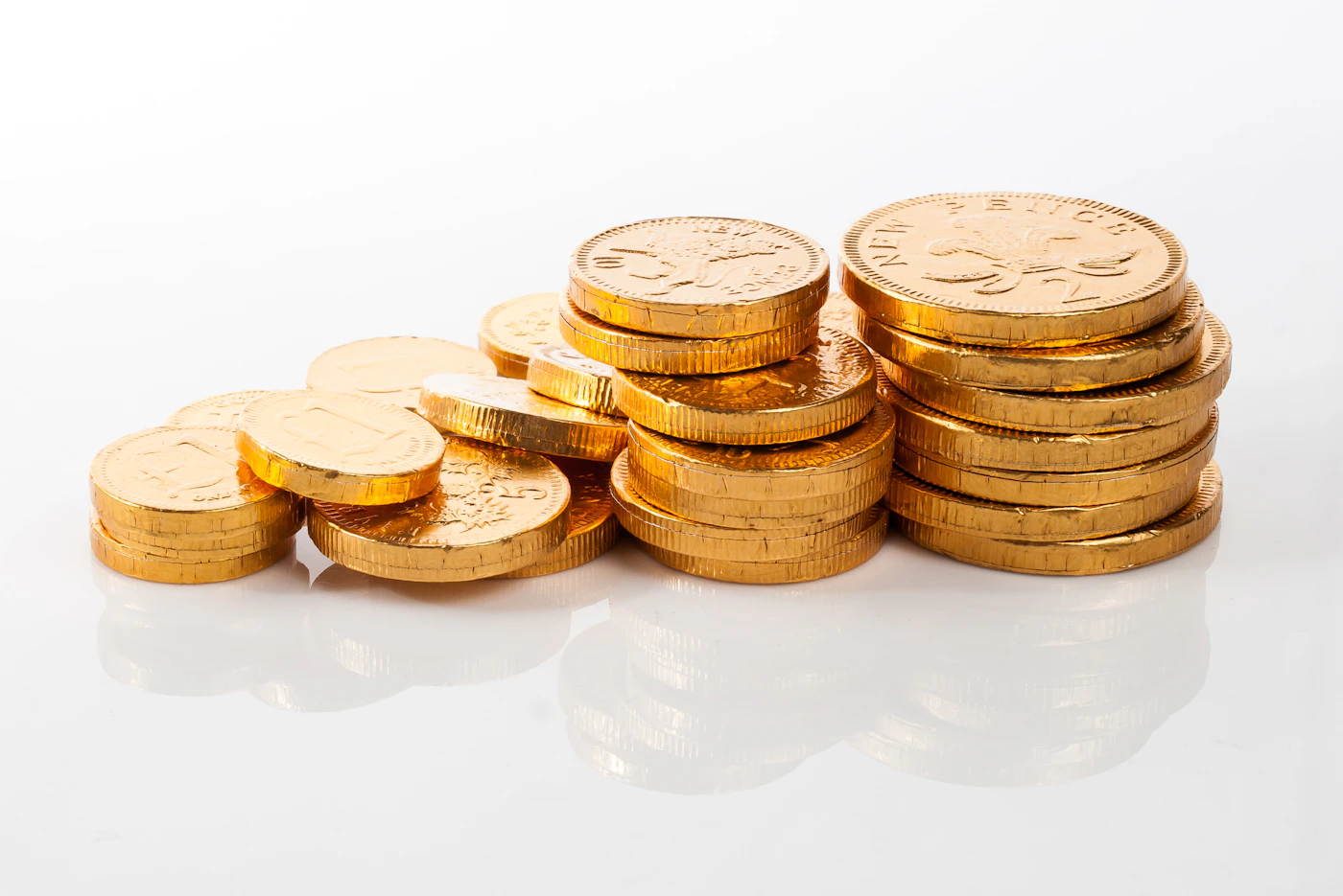 Pièces d'or empilées, symbole du bonus GT Bet Casino